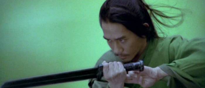 Broken Sword (Tony Leung Chiu Wai) prepares for action